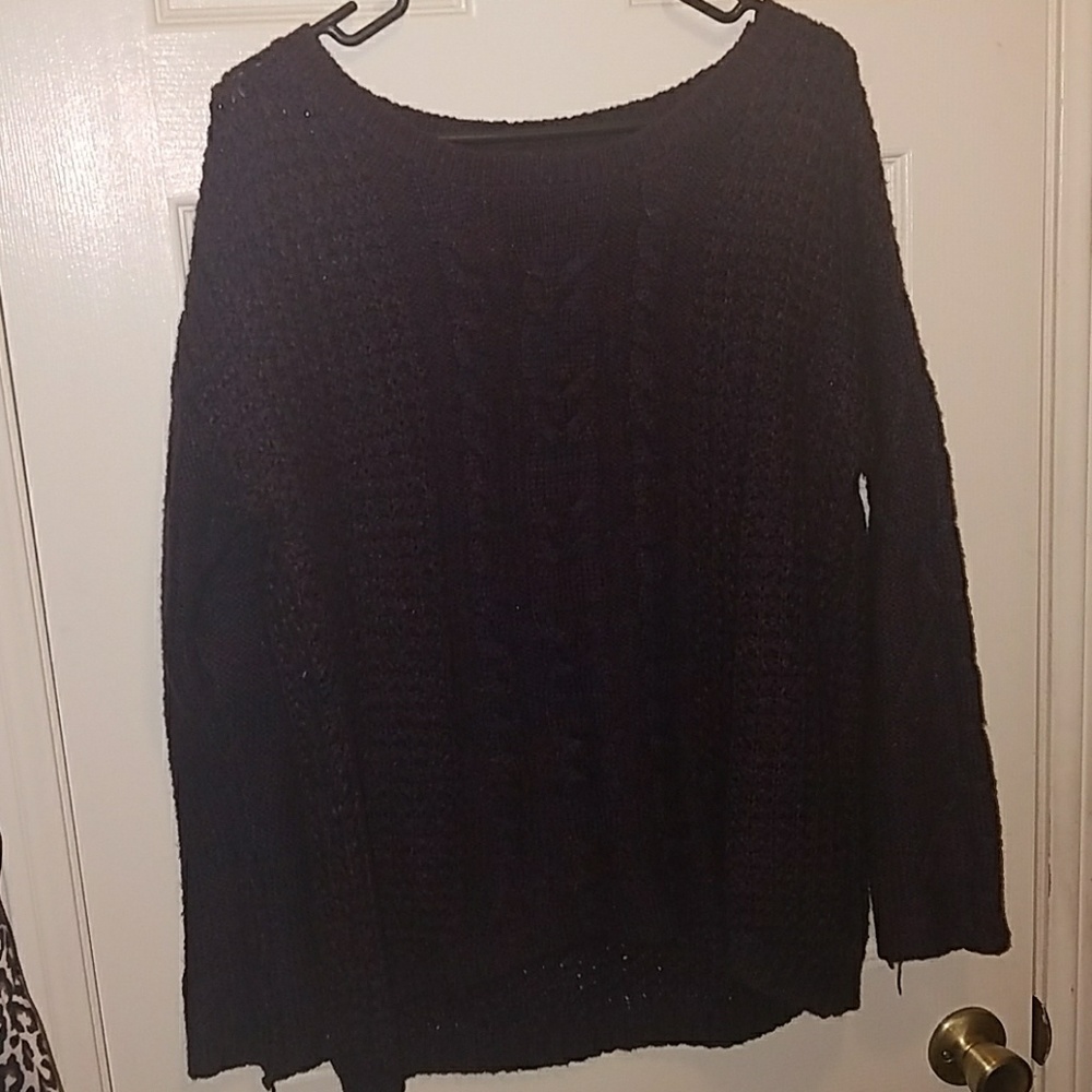Mixed purple colored knitted sweater.